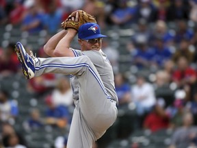 Toronto Blue Jays starting pitcher Trent Thornton works against the Texas Rangers during the first inning of a baseball game Friday, May 3, 2019, in Arlington, Texas.