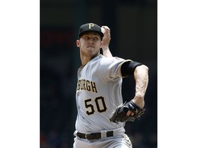 Pittsburgh Pirates starting pitcher Jameson Taillon delivers against the Texas Rangers during the first inning of a baseball game Wednesday May 1, 2019, in Arlington, Texas.