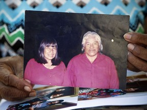 Maka indigenous leader-in-training Tsiweyenki, or Gloria Elizeche in Spanish, holds an undated portrait of herself with her husband Andres Chemei in Mariano Roque Alonso, Paraguay, Monday, April 29, 2019. After Chemei, a widely respected figure who led the Maka for 40 years, died in February without an heir, Maka leaders chose his widow to be one of the first female chiefs of an indigenous people in the South American country.