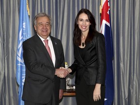 United Nations Secretary-General Antonio Guterres, left, shakes hands with New Zealand's Prime Minister Jacinda Ardern at Government House in Auckland, New Zealand, Sunday, May 12, 2019. Guterres in on a two-day visit to New Zealand as part of a broader visit to the Pacific region and is Guterres' first visit as UN Secretary-General.