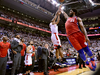 Philadelphia 76ers centre Joel Embiid attempts to stop Toronto Raptors forward Kawhi Leonard’s last-second shot.