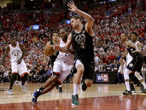 Toronto Raptors forward Kawhi Leonard (2) drives to the net as Milwaukee Bucks centre Brook Lopez (11) defends during second half NBA Eastern Conference finals.