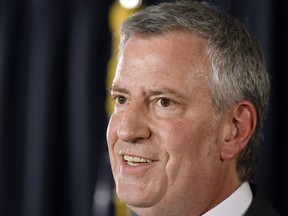 FILE - In this March 26, 2019, file photo, New York City Mayor Bill de Blasio speaks about New York City budget priorities during a news conference at the state Capitol in Albany, N.Y. De Blasio announced Thursday, May 16 that he will seek the Democratic nomination for president, adding his name to an already long list of candidates itching for a chance to take on Donald Trump.