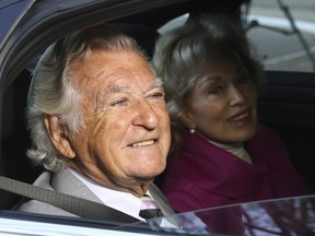 FILE - In this Sept. 2013, file photo, former Australian Prime Minister Bob Hawke, left, and his wife Blanche d'Alpuget arrive at the Australian Labor Party's campaign launch in Brisbane, Australia. Hawke, Australia's 23rd prime minister, has died in Sydney at age 89.