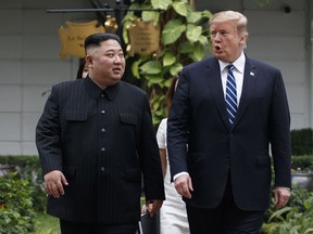 FILE - In this Feb. 28, 2019 file photo, President Donald Trump and North Korean leader Kim Jong Un take a walk after their first meeting at the Sofitel Legend Metropole Hanoi hotel, in Hanoi. North Korea says nuclear negotiations with the United States will never resume unless Washington changes its negotiating tactics.