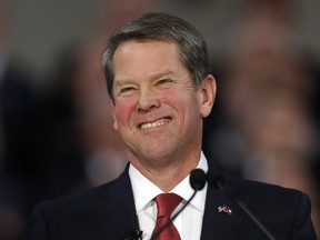 FILE - In this Jan. 14, 2019, file photo, Gov. Brian Kemp speaks after being sworn in as Georgia's governor during a ceremony at Georgia Tech's McCamish Pavilion in Atlanta. Kemp has delayed an annual trip to Los Angeles to promote Georgia's film industry as movie executives, producers and actors criticize the state's new abortion ban.