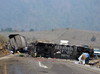Rescuers and firemen at the scene of a crash between a bus carrying Catholic pilgrims and a semi-trailer on a mountain road in Veracruz, Mexico on May 29, 2019.