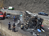 Rescuers and firemen at the scene of a crash between a bus carrying Catholic pilgrims and a semi-trailer on a mountain road in Veracruz, Mexico on May 29, 2019.