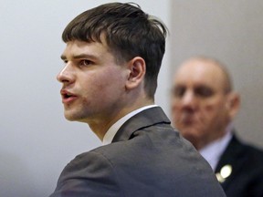 FILE - In this April 3, 2018 file photo, Nathan Carman, accused by family members of killing his millionaire grandfather and possibly his mother in an attempt to collect inheritance money, speaks during a probate hearing in district court in Concord, N.H. A New Hampshire judge released a ruling, Friday, May 10, 2019, saying Carman's late grandfather, John Chakalos, was not a state resident and that the New Hampshire probate court trial, scheduled for June 2019, had been cancelled.