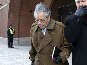 FILE - In this Jan. 30, 2019, file photo, Insys Therapeutics founder John Kapoor leaves federal court in Boston. On Thursday, May 2, 2019, Kapoor was found guilty in a scheme to bribe doctors to boost sales of a highly addictive fentanyl spray meant for cancer patients with severe pain.