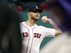 Boston Red Sox starting pitcher Chris Sale delivers against the Colorado Rockies during the first inning of a baseball game Tuesday, May 14, 2019, at Fenway Park in Boston.