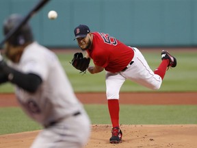 Boston Red Sox starting pitcher Eduardo Rodriguez delivers against the Colorado Rockies during the first inning of a baseball game Wednesday, May 15, 2019, at Fenway Park in Boston.