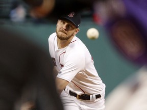 Boston Red Sox starting pitcher Chris Sale delivers against the Colorado Rockies during the first inning of a baseball game Tuesday, May 14, 2019, at Fenway Park in Boston.