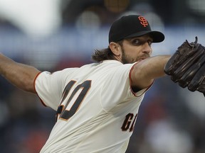 San Francisco Giants pitcher Madison Bumgarner works against the Los Angeles Dodgers during the first inning of a baseball game Wednesday, May 1, 2019, in San Francisco.