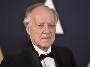 FILE - In this Nov. 12, 2016 file photo, Werner Herzog arrives at the 2016 Governors Awards in Los Angeles. Herzog is calling "The Mandalorian" a phenomenal achievement" after joining the cast of the streaming series set in the "Star Wars" universe. The series, starring Pedro Pascal, Gina Carano and Carl Weathers, is set to premiere in November 2019. with the launch of the new Disney Plus streaming service.