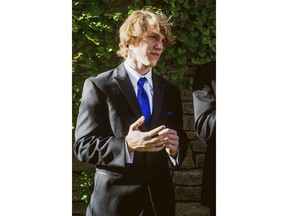 FILE - This undated file photo provided by Matthew Westmoreland shows Riley Howell. A North Carolina police department has honored college student Howell and his family after he was killed when a gunman opened fire inside a classroom. News outlets report the family of UNC Charlotte student Howell received the Civilian Medal of Valor on Wednesday, May 15, 2019, from the Charlotte-Mecklenburg Police Department.