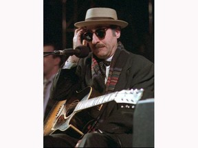 FILE - This March 28, 1998 file photo shows Leon Redbone performing at the eighth annual Redwood Coast Dixieland Jazz Festival in Eureka, Calif. Redbone, the acclaimed singer and guitarist who performed jazz, ragtime and Tin Pan Alley-styled songs, died Thursday, May 30, 2019, according to a statement released by his family. No details about his death were provided.