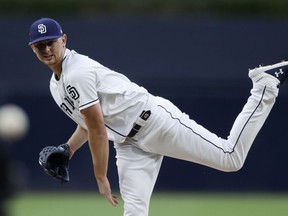 San Diego Padres starting pitcher Eric Lauer works against a Pittsburgh Pirates batter during the first inning of a baseball game Thursday, May 16, 2019, in San Diego.