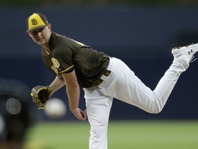 San Diego Padres starting pitcher Eric Lauer works against a Los Angeles Dodgers batter during the first inning of a baseball game Friday, May 3, 2019, in San Diego.