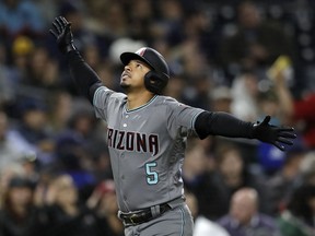 Arizona Diamondbacks' Eduardo Escobar looks up after hitting a home run during the fourth inning of a baseball game against the San Diego Padres, Tuesday, May 21, 2019, in San Diego.