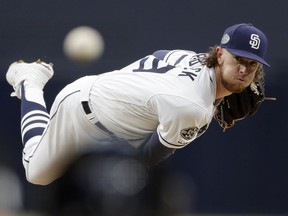 San Diego Padres starting pitcher Chris Paddack works against a New York Mets batter during the first inning of a baseball game Monday, May 6, 2019, in San Diego.