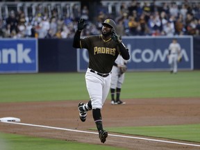 San Diego Padres' Franmil Reyes reacts after hitting a home run during the first inning of a baseball game against the Pittsburgh Pirates, Friday, May 17, 2019, in San Diego.