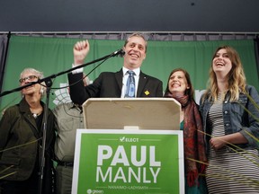 Green Party's Paul Manly celebrates with his family from (left to right), his mother Eva and father Jim, wife Samantha and daughter Aven after results come in for the Nanaimo-Ladysmith byelection at the Cavallotti Lodge in Nanaimo, B.C., on Monday, May 6, 2019.