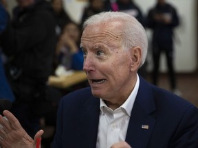 Former vice president and Democratic presidential candidate Joe Biden jokingly reacts to a comment made by a patron at King Taco Wednesday, May 8, 2019, in Los Angeles.