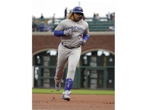 Toronto Blue Jays' Vladimir Guerrero Jr. rounds the bases after hitting a solo home run against the San Francisco Giants during the first inning of a baseball game in San Francisco, Tuesday, May 14, 2019.
