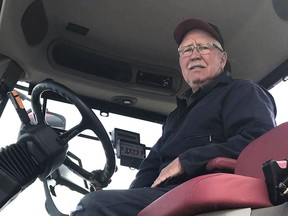Randy Richards, a 65-year-old farmer near Hope, N.D., poses for a photo Friday, May 10, 2019, at the request of The Associated Press, says the tariff war of the past year and a half has hit hard, and he was angry that more may be coming. Richards says he farms more than 6,000 acres of wheat, barley, soybeans, pinto beans and corn, and says tariffs have driven up the cost of the raw products he needs to run and supply his business and driven down the prices of what he has to sell.
