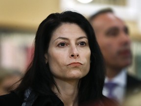 FILE - In this March 18, 2019, file photo, Michigan Attorney General Dana Nessel attends an event for Democratic presidential candidate Sen. Kirsten Gillibrand, D-N.Y., in Clawson, Mich. Nessel said Wednesday, May 22, that a Republican-enacted law making it harder to put proposals on the ballot is unconstitutional. Her opinion binds state officials unless it is reversed by a court. A legal fight is expected.