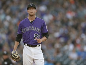 Colorado Rockies starting pitcher Kyle Freeland reacts after giving up a single to Baltimore Orioles' Keon Broxton in the first inning of a baseball game Saturday, May 25, 2019, in Denver.
