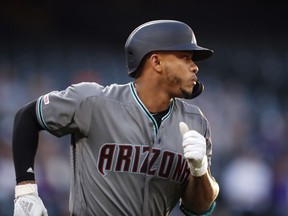Arizona Diamondbacks' Ketel Marte heads up the first base line after hitting a two-run home run off Colorado Rockies starting pitcher Tyler Anderson in the third inning of a baseball game Friday, May 3, 2019, in Denver.