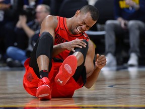 Portland Trail Blazers guard Rodney Hood reacts after being injured in the second half of Game 7 of an NBA basketball second-round playoff series against the Denver Nuggets Sunday, May 12, 2019, in Denver.