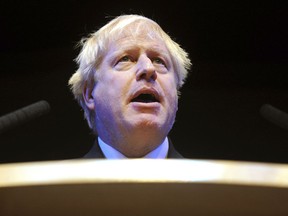 FILE - In this Tuesday, Oct. 2, 2018 file photo, British Conservative Party Member of Parliament Boris Johnson speaks at a fringe event during the Conservative Party annual conference at the International Convention Centre, in Birmingham, England. Prime Minister Theresa May's announcement that she will leave 10 Downing Street has set off a fierce competition to succeed her as Conservative Party leader _ and as the next prime minister.