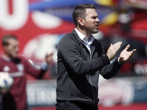Toronto FC head coach Greg Vanney directs his team against the Colorado Rapids in the first half of an MLS soccer match in Commerce City, Colo., on April 14, 2018. Squeezed between do-or-die playoff games between the Raptors and 76ers, Toronto FC hosts the top team in the East when the Philadelphia Union visit BMO Field on Saturday.