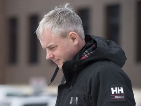 Dennis Oland heads from the Law Courts as he continues his testimony in Saint John, N.B., on Thursday, March 7, 2019. Final arguments will be heard today in the trial of Dennis Oland who is charged with second-degree murder in the death of his wealthy father in July, 2011.
