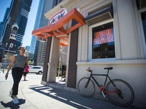 An A&W Restaurant in Toronto is photographed on Monday, July 9, 2018. A&W Revenue Royalties Income Fund increased its distributions to unitholders as it reported its first-quarter profit fell to $5.7 million, compared with $6.3 million a year ago, due to a non-cash charge.