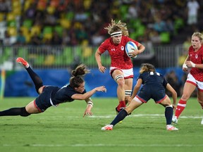 Canada's Karen Paquin runs the ball as she avoids a tackle from Great Britain's Emily Scarratt, left, during the bronze medal match in women's rugby sevens at the 2016 Olympic Summer Games in Rio de Janeiro, Brazil on Monday, Aug. 8, 2016. Karen Paquin helped Canada win a World Rugby Sevens Series stop in Japan last month in her return from a long -term knee injury. This weekend she looks to do it again on home soil in Langford, B.C.