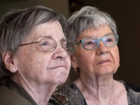 Cecile Dionne, left, and her sister Annette are seen Thursday, May 18, 2017 in St-Bruno, Que. Annette and Cecile Dionne admit they don't know much about the online world of pint-sized content creators dubbed "kidfluencers." But the sisters, who turn 85 on Tuesday, can tell you a thing or two about the perils of childhood celebrity.THE CANADIAN PRESS/Paul Chiasson