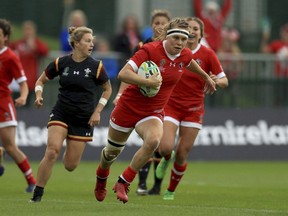 Canada's Karen Paquin scores a try against Wales during the 2017 Women's World Cup, 5th Place Semi Final match at the Queen's University, Belfast, Northern Ireland, Tuesday, Aug. 22, 2017. Karen Paquin returned from a long-term knee injury last month to help Canada win a World Series event in Japan. Paquin and her teammates hope to recreate that success on home soil this weekend.