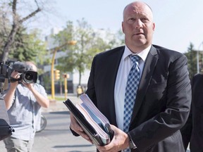 The Regina Police Service is the latest agency in Canada to pilot a program that allows sexual assault cases to be reviewed by outside experts. Regina Police Services chief Evan Bray, left arrives to the Court of Queen's Bench in Regina on Thursday, August 23, 2018.