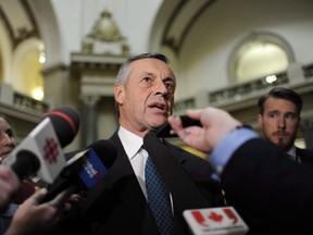 Don Morgan, then-deputy premier of Saskatchewan, speaks to reporters following the speech from the throne at the Legislative Building in Regina on October 25, 2017.