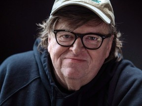 Film director Michael Moore poses for a portrait while promoting his new movie, "Fahrenheit 11/9," during the Toronto International Film Festival in Toronto, Saturday, Sept. 8, 2018. The Oscar and Emmy-winning documentary filmmaker will bring his "everyman perspective" on the state of the world to Niagara Falls, London, Ont. and Toronto in late September.