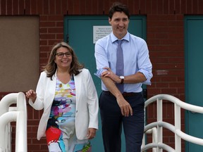 Prime Minister Justin Trudeau walks with Liberal candidate Michelle Corfield who'll run in the upcoming federal by election after greeting supporters along the Harbourfront Walkway in Nanaimo, B.C., on Monday, March 25, 2019. Voters are heading to the polls to elect a member of Parliament in the British Columbia riding of Nanaimo-Ladysmith today in what could be an indicator of the October federal election.The leaders of the Liberals, Conservatives, Greens, NDP and the People's Party of Canada have all visited the riding since the byelection was called.THE CANADIAN PRESS/Chad Hipolito
