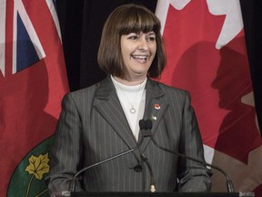 Ontario's Minister for Government Services Marie-France Lalonde smiles during a news conference at the Queens Park Legislature in Toronto on Thursday Nov. 1, 2017. Ontario Liberal politician Marie-France Lalonde wants to run for Parliament to run to replace retired general Andrew Leslie in the Ottawa riding he's vacating after just one term.