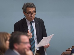 Quebec Solidaire MNA Amir Khadir questions the government over asbestos during question period, Wednesday, June 13, 2018 at the legislature in Quebec City. Privileged Quebec politicians shouldn't be accepting fat cheques from taxpayers when they quit politics or lose elections, says a recently departed member of the legislature.