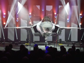 U.S. officials have warned the Trudeau government that its plan to hold an open competition to replace its aging CF-18s is incompatible with Canada's obligations as a member of the F-35 stealth fighter program. The unveiling of the first F-35 fighter plane to be delivered to the Netherlands, which is partnering with the United States in the fighter program, at Lockheed Martin Aeronautics in Fort Worth, Texas, Wednesday, Jan. 30, 2019.