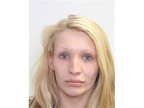 Louisa Wallis, 25, is shown in this undated police handout photo. Nearly three dozen charges have been laid against a man and woman in Edmonton who are accused of involvement in human trafficking. Police say they became aware this past February of a 15-year-old girl who was getting into the sex trade. The teen was apprehended under the Protection of Sexually Exploited Children???s Act, and an investigation revealed that she and a 16-year-old girl had been recruited by two adults between last December and March from a central-area home. A 25-year-old woman and a 24-year-old man were arrested May 1. Charges that include human trafficking, sexual assault and making child pornography have been laid against Louisa Wallis and Michael Moffat.