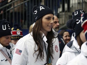 In this March 4, 2018, file photo, Hilary Knight, of the gold medal winning U.S. women's Olympic hockey team, attends a SheBelieves Cup women's soccer match between the United States and France, in Harrison, N.J. Knight and Marie-Philip Poulin are among 200 women who say they will not play in any North American women's hockey league next season "until we get the resources that professional hockey demands and deserves."